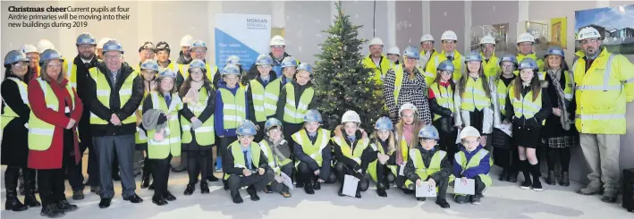  ??  ?? Christmas cheer Current pupils at four Airdrie primaries will be moving into their new buildings during 2019