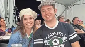  ?? FAMILY PHOTO ?? Melissa and Hugh Miller enjoy their time at Milwaukee Irish Fest in August, at least until a beer they ordered resulted in a charge of more than $7,000 on their credit card. Two months later, they’re still trying to clear up the confusion.
