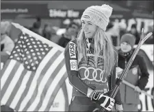  ?? MARCO TACCA/AP PHOTO ?? Mikaela Shiffrin smiles after winning a women’s World Cup slalom race on Saturday at Ofterschwa­ng, Germany.