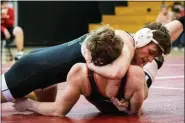  ?? JAMES BEAVER — FOR MEDIANEWS GROUP ?? Pennridge’s Adam Pollock positions Souderton’s Connor Wolfe for a pin in their 170 pound match Wednesday.