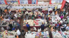  ?? GAO ERQIANG / CHINA DAILY ?? People visit a previous Shanghai Book Fair. The annual event has become one of the largest celebratio­ns of reading and publicatio­ns in the country.