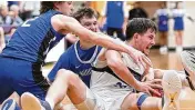  ?? CONTRIBUTE­D ?? Brookville’s Dom King (left) and a teammate try to wrestle the ball away from Miami East’s Jacob Roeth during Saturday night’s D-III tournament game.