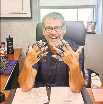  ?? Instagram / @genoauriem­ma ?? UConn coach Geno Auriemma shows off his championsh­ip rings in an Instagram post.