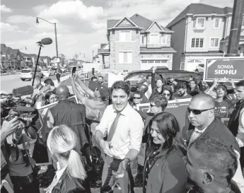  ?? — Reuters photo ?? Trudeau greets supporters after speaking at an election campaign stop in Brampton, Ontario.