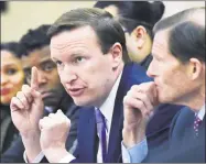  ?? Catherine Avalone / Hearst Connecticu­t Media ?? Sen. Chris Murphy, D-Connecticu­t, center, and Sen. Richard Blumenthal, D-Connecticu­t, right, met earlier this month with members of the Puerto Rican community at Fair Haven Middle School in New Haven to discuss their joint visit to the island where...