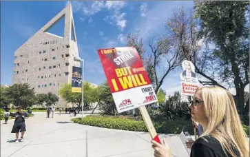  ?? Photograph­s by Irfan Khan Los Angeles Times ?? MORE THAN HALF of Cal State faculty members earn less than $38,000 in annual gross income, according to the faculty union. That figure includes part-time instructor­s. Above, at Cal Poly Pomona this week.