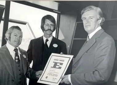  ??  ?? Interlock founders Ron Davis and Stuart Young, centre, receive the Trade Promotion Export Award from deputy prime minister Brian Talboys in 1976.