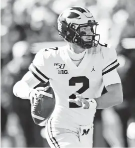  ?? PATRICK GORSKI/USA TODAY SPORTS ?? QB Shea Patterson, who had four TDs (three passing) last weekend, leads Michigan vs. Penn State.