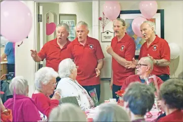  ?? Dan Watson/The Signal ?? The Santa Clarita Men of Harmony — from left: Bob Lang, Frank Norton, Jack Matson and Roger Baartman — sing “My Wild Irish Rose” for the dozens of attendees at the Valentine’s Day Tea Party held at Atria Senior Living in Santa Clarita on Thursday.