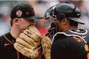  ?? Ashley Landis/Associated Press ?? Catcher Blake Sabol, right, had more success with Logan Webb’s tricky sinker in Sunday’s game.