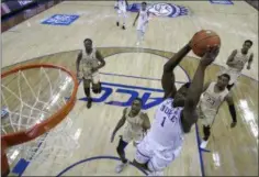  ?? CHUCK BURTON - THE ASSOCIATED PRESS ?? Duke’s Zion Williamson (1) goes up to dunk against Florida State during the first half of the NCAA college basketball championsh­ip game of the Atlantic Coast Conference tournament in Charlotte, N.C., Saturday, March 16, 2019.