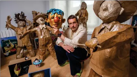  ?? Pictures: Colin Mearns ?? Glasgow-based artist Willie Sutherland at home with some of his cardboard figures that will form his first solo exhibition