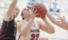  ?? BROCK UNIVERSITY ?? Brock's Courtney McPherson (22) goes up for a layup in women's university basketball against McMaster.