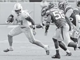  ?? CHARLES TRAINOR JR ctrainor@miamiheral­d.com ?? Running back Kalen Ballage, the Dolphins’ fourth-round pick in 2018, averaged a paltry 1.8 yards per carry last season, necessitat­ing the signing of Jordan Howard.