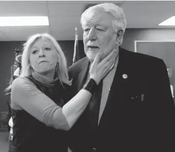  ?? ALLEN MCINNIS/ THE GAZETTE ?? A supporter says goodbye Friday to Liberal MNA Henri-François Gautrin, who has served for 25 years. He announced he will not seek re-election during a press conference in Montreal on Friday.