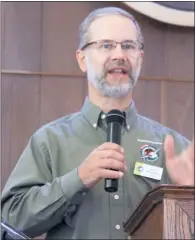  ??  ?? Cliff Hartsfield of Port Republic, a Southern Maryland coordinato­r for Operation Christmas Child, speaks to the congregati­on at Union Church in North Beach on Sunday.