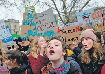  ?? Sean Gallup Getty Images ?? STUDENTS rally in Berlin in March to raise awareness about the climate change crisis. Teenage activists are among those who organized the global climate strike planned Friday in the U.S. and many other countries.