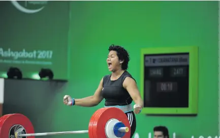 ??  ?? Eileen Cikamatana celebrates her lift at the 2017 Asian Indoor Games in Turkmenist­an.Photo: Team Fiji