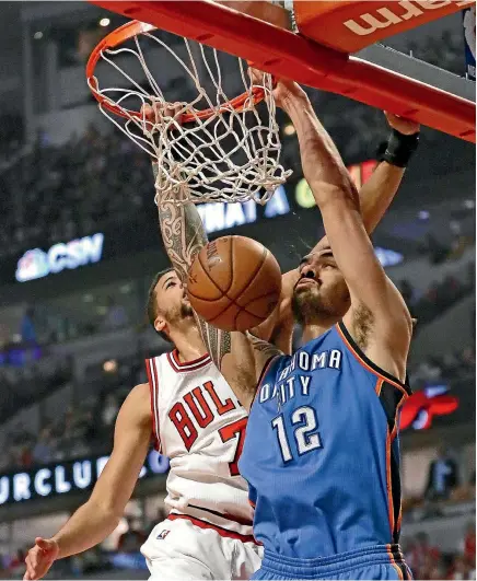  ?? GETTY IMAGES ?? Kiwi Steven Adams shows his power against the Chicago Bulls at the start of the year.