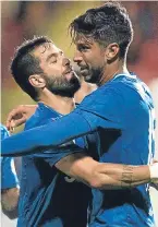  ??  ?? Eduardo Herrera, right, celebrates his goal with Daniel Candeias.