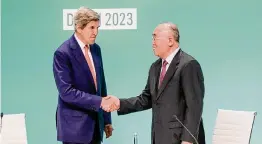  ?? Fadel Dawod/Getty Images ?? John Kerry, U.S. special envoy for climate, meets with his Chinese counterpar­t, Xie Zhenhua, at the COP28 climate conference on Dec. 13 in Dubai.