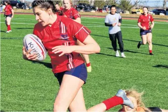  ?? ?? Windsor's Ava Shearer was quick on her feet April 7, evading several tackle attempts.