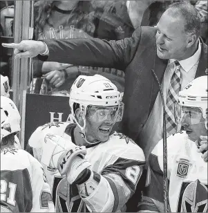  ?? AP PHOTO ?? In this Oct. 6, 2017, file photo, Vegas Golden Knights coach Gerard Gallant points from the bench during the third period of an NHL game against the Dallas Stars in Dallas.