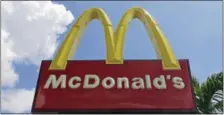  ?? ASSOCIATED PRESS FILE ?? This Tuesday, June 28 photo shows a McDonald’s sign in Miami. McDonald’s reported its shares had their biggest one‑day percentage decline since the financial crisis on Tuesday.