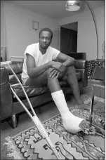  ?? G. PAUL BURNETT — THE ASSOCIATED PRESS ?? Jim Chones, shown on May 5, 1976, after breaking his right foot in practice the day before.