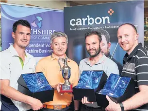  ??  ?? Champs Mark Christie, second left, from Carbon, presents the winning team with their awards, from left, Colin Dolby, Douglas Dickie and Graham Lambert. Photos: Fraser Band