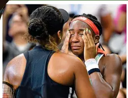  ?? REUTERS ?? Under pressure: Gauff (right) is comforted by Osaka