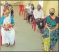  ??  ?? Beneficiar­ies waiting at Abhinav School, Dombivli (E), for their doses.