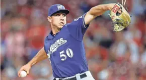  ?? JOE ROBBINS / GETTY IMAGES ?? For the second consecutiv­e spring, Brewers reliever Jacob Barnes is scuffling with command. He got through it last year and Craig Counsell believes he will again.