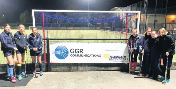  ??  ?? Team Bath Buccaneers Junior Hockey Academy players with the GGR Communicat­ions branding at the University of Bath Sports Training Village