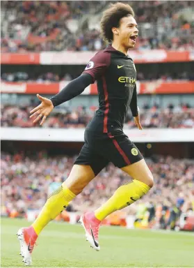  ?? Picture: AFP ?? DOING EVERYTHING RIGHT. Manchester City’s German midfielder Leroy Sane celebrates after scoring the opening goal against Arsenal at The Emirates in London yesterday.