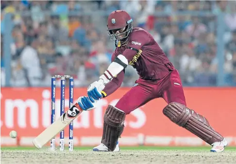  ??  ?? CONTEST: Marlon Samuels of the West Indies in the final of the last T20 World Cup – an event which will not be going ahead this year