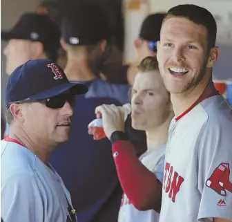  ?? AP PHOTOS ?? ZERO TOLERANCE: Chris Sale smiles in the Red Sox dugout during yesterday’s 4-0 victory against the Mariners in Seattle. Sale was dominant once again, pitching seven shutout innings and allowing just three hits while striking out 11.