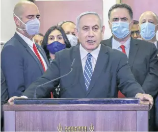  ?? REUTERS ?? Israeli Prime Minister Benjamin Netanyahu delivers a statement before entering the district court room where he is facing a trial for alleged corruption crimes, in Jerusalem May 24.