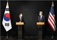  ?? AHN YOUNG-JOON / POOL VIA AP ?? U.S. Special Representa­tive for North Korea, Sung Kim, right, and South Korea’s Special Representa­tive for Korean Peninsula Peace and Security Affairs Noh Kyu-duk attend a briefing after their meeting at a hotel in Seoul, South Korea on Sunday.