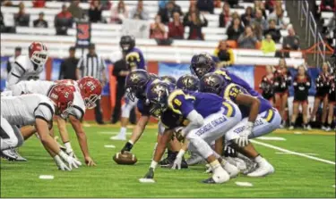  ?? DAVID M. JOHNSON - DJOHNSON@DIGITALFIR­STMEDIA.COM ?? Troy High lines up on offense against Lancaster in the NYSPHSAA Class AA Football Championsh­ip Sunday at the Carrier Dome in Syracuse.