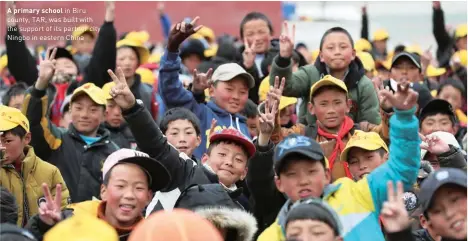  ??  ?? A primary school in Biru county, TAR, was built with the support of its partner city Ningbo in eastern China