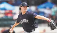  ?? Carlos Osorio / Associated Press ?? Yankees starting pitcher Gerrit Cole throws during a spring training game on March 5 in Lakeland, Fla.