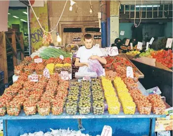  ?? GIORGOS DIAKOS LOMNIOS/KOUKOUMI HOTEL VIA THE NEW YORK TIMES ?? In an image provided by Eager Tourist, a produce market in Tel Aviv. From Mexico to Greece, plant-centric hotels, restaurant­s and tours are proliferat­ing: in Tel Aviv, Eager Tourist began offering vegan culinary tours that visit food markets, farmers and restaurant­s in 2019.