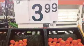  ?? FILE PIC ?? The price of tomatoes displayed at a hypermarke­t. Hypermarke­ts should treat customers fairly by ensuring they are paying the right price at the cashier counters.