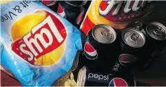  ?? JOE RAEDLE / GETTY IMAGES ?? PepsiCo is relying on the strength of its Frito-Lay unit to fuel growth as it grapples with a soda slump.