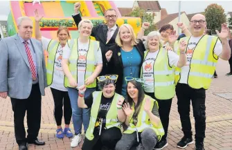  ??  ?? Team effort Fairhill Community Group volunteers with Cllr Joe Lowe, Provost Ian Mcallan and Christina Mckelvie MSP 080918fair­hill_007