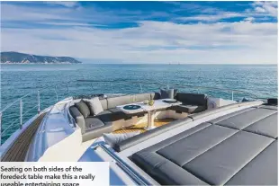  ??  ?? Seating on both sides of the foredeck table make this a really useable entertaini­ng space