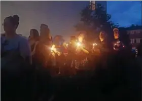  ?? BILL RETTEW JR. — DIGITAL FIRST MEDIA ?? Supporters of slain teenager Bianca Roberson meet for a vigil in her honor in the backyard of her family’s Westtown home Friday night.