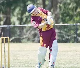  ??  ?? Drouin’s John Berry plays an aggressive straight drive during the division two match against Warragul.