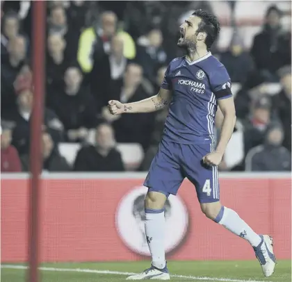  ??  ?? 2 Chelsea midfielder Cesc Fabregas celebrates scoring what turned out to be the winner against Sunderland at the Stadium of Light.